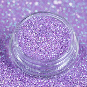 Nagelpoeder violet voor nail art. Roze en paarse kleuren met glitter effect.