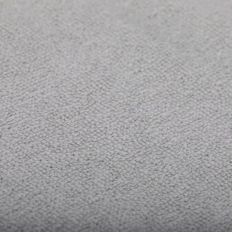 Detailopname van het zachte, badstof materiaal.