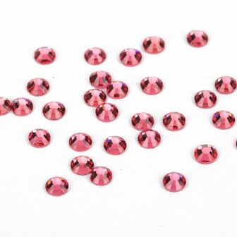 lichtroze nagelsteentjes van glas