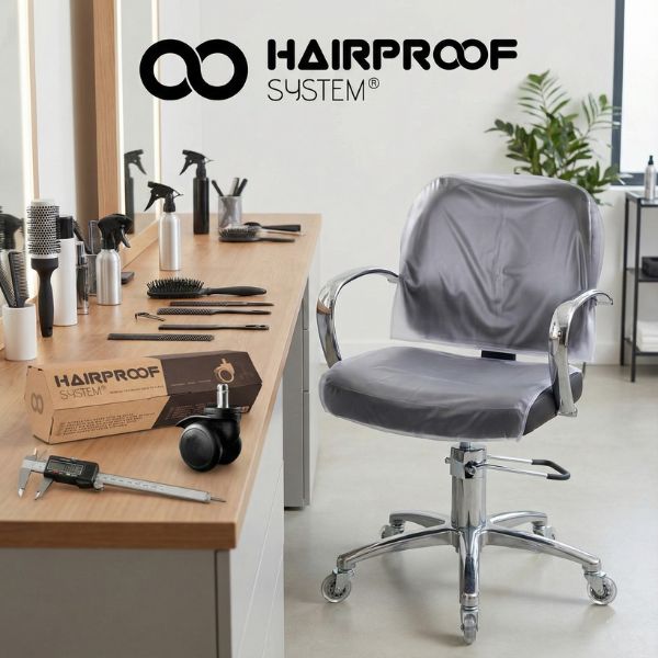 Kappersstoel met geruisloze skate wielen, beschermhoes en Hairproof System haarvrije wielen verpakking voor reserveonderdelen.
